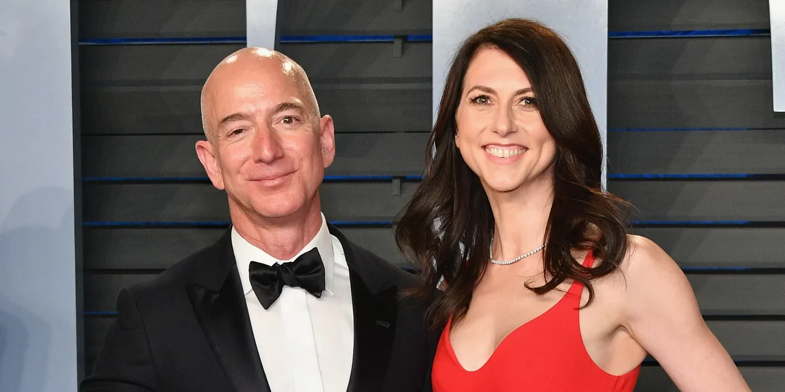 Jeff and mackenzie A man and woman posing for the camera.