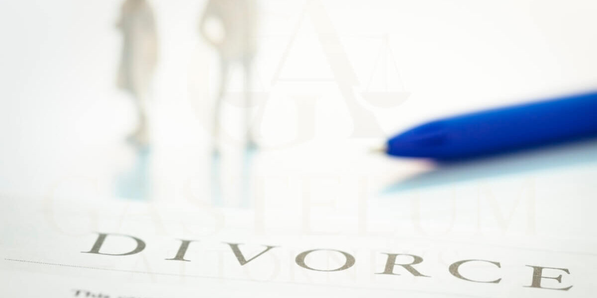 Divorce document with pen and silhouettes.